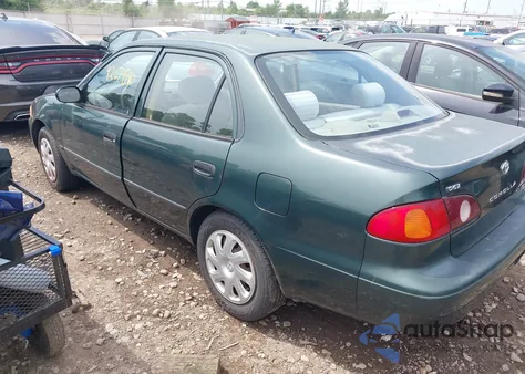 2001 Toyota Corolla Ce z USA, uszkodzony, nr VIN 2T1BR12E81C475853